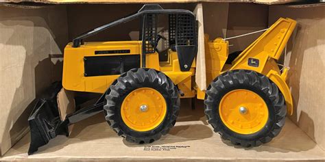 toys john deere skid steer|john deere log skidder toy.